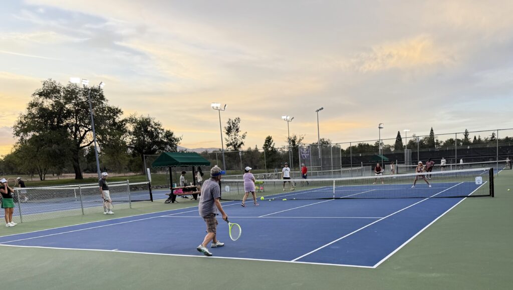 Tennis tournament at Reno Tennis Center featuring singles and doubles competitive formats.